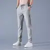 Pantalones de seda de hielo para hombre, nuevos pantalones casuales de negocios finos de etiqueta negra de verano, pantalones deportivos rectos, transpirables y elásticos de talla grande