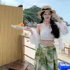 Pantalones de pierna ancha de cintura alta estilo vacacional de Yunnan junto al mar Pantalones Top bohemio Chaqueta protectora del sol