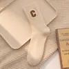 Calcetines bordados con la letra C, calcetines de lana para mujer hasta la pantorrilla, engrosados para abrigar en otoño e invierno, mezcla de cachemira, estilo preppy, calcetines largos para invierno