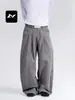 Con un rico toque americano de alta gama, pantalones casuales plisados para hombre y mujer, marca de moda de corte holgado y limpio, silueta con caída, pantalones de pierna curva