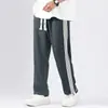 Nuevos Pantalones Deportivos Casuales Elásticos de Rayas Estilo Coreano para Hombre de Primavera y Otoño, Pantalones Jogger de Moda, Mismo Estilo que Celebridades de Internet de Pareja