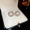 Pendientes de Perla de Circonita de Moda de Aguja Plateada Pendientes de Botón Retro de Lujo Ligero de Nicho Francés Pendientes Nuevos 2026
