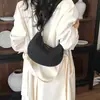 Versátil bolsa de axila tipo dumpling para mujer, nueva bolsa de luna creciente otoño/invierno 2026, diseño de nicho, bolso cruzado tejido, bolso de hombro de moda