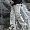 Calça de Assalto para Exterior 2025 Masculina Primavera e Outono Calças Cargo Funcionais Montanhismo À Prova de Vento e Impermeáveis Calças Casuais Retas Largas