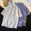 Camisa a rayas versátil de moda de Hong Kong para hombre, de manga corta, verano, marca de moda, camisa casual simple, chaqueta holgada guapa de media manga