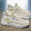 Verão 2026 Novos Sapatos Masculinos de Malha Vazada Respiráveis Moda Versátil Sapatos de Pai Casuais Esportivos Sapatos de Corrida Sapatos da Moda