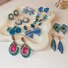 Agulha de prata luxo leve azul diamante de alta qualidade flor amor brincos moda temperamento brincos Rede de celebridades brincos atacado mulheres