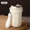 Copo isolado de aço inoxidável com revestimento cerâmico em estoque, um copo luxuoso e de alta qualidade, um copo isolado simples e elegante com opções duplas de bebida