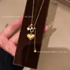 Colar Vintage "Bunda de Pêssego" Pingente de Pêssego Dourado Escovado Fecho Universal Corrente para Suéter de Luxo Leve Nicho