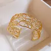 Pulsera Redonda Entrelazada Hueca Transfronteriza Europea y Americana, Pulsera de Declaración Moderna y Única, Joyería de Lujo Ligero de Gama Alta para Mujeres