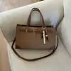 Bolsa Transversal de Ombro Único Texturizada Novo Estilo 2026 Primavera Personalizada Simples Moda Casual Bolsa Tote Nicho Feminina