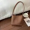 Bolso de axila de nicho de alta gama para mujer, nuevo modelo de verano 2026, bolso de cubo de axila de un solo hombro súper popular y exquisito