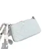 Nueva bolsa de mahjong con forma de estrella 25B estilo Chanel con cadena plateada y hebilla de pedrería, bolso cruzado acolchado con cadena al hombro