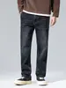 Moda popular para hombre / Nueva colección Primavera/Otoño 2026: pantalones de mezclilla elásticos para hombre, tiro medio a alto, ligeros, estilo casual de negocios, corte ajustado, versátiles
