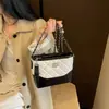 Bolsa de ombro com corrente em padrão diamante para mulheres, nova moda tendência 2026, bolsa de ombro e transversal de luxo para o dia a dia, bolsa tipo balde