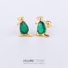 Acero titanio 316L chapado en oro cobre micro-incrustado circonio arete para cartílago de la oreja circonita verde arete para la oreja Europeo y Americano Comercio exterior transfronterizo perforación arete para cartílago de la oreja