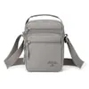 Bolsa transversal masculina, bolsa de ombro casual feminina leve com múltiplos bolsos, bolsa quadrada pequena estilo japonês e coreano, mochila horizontal em tecido de nylon
