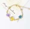Pulsera de Resina con Flores Secas de Flor de Cerezo Chapada en Cobre Color Oro Real Joyería Conservadora de Color Mariposa Perla Pulsera Exquisita Planta