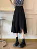 Falda midi negra de línea A para mujer, adecuada para primavera y otoño, talla grande, casual, de cintura alta y con dobladillo asimétrico.