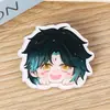 Venta al por mayor de mercancía temática de anime y videojuegos, incluyendo pines de acrílico de dibujos animados, lindos dijes para mochila y accesorios decorativos