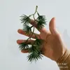 Planta de simulación transfronteriza multi-cabeza pino de bienvenida árbol de Navidad colgante de pared adornos decorativos de ratán accesorios de planta acuática de plástico
