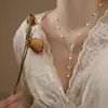 Collar de Concha con Borla de Mariposa Super Hada para Mujer, Lujo Accesible Diseño de Nicho, Accesorios de Cadena para Clavícula Versátiles y Delicados Franceses