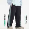 Nueva colección de otoño: Pantalones deportivos de exterior suaves a rayas tipo patchwork para niños, talla 26, corte holgado, pierna ancha, pantalones largos, pantalones cómodos para niños