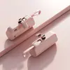 Mini tesoro de carga de cápsula compartida compacto de gran capacidad 5000 mA con soporte de cable carga rápida energía móvil al por mayor