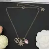 Modelo Transfronterizo Nuevo 2026 Réplica Chanel con Múltiples Accesorios Collar Doble C de Girasol Collar de Lujo de Alta Gama