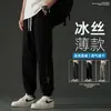 Bolsa de cintura cruzada Amazon Explosions Cintura Rota Borde Rasgado Amoníaco Elástico en Cuatro Lados Seda Helada Pantalones de Nueve Puntos Estilo Hong Kong para Hombre Sueltos Elásticos