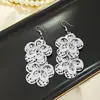 Europa e Estados Unidos transfronteiriço personalidade criativa brincos de flores moda personalidade multi-camada de metal vento simples oco borla eardrop