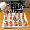 Lindo creativo bebida té con leche sostener tortuga capibara muñeco llavero colgante de bolsa llavero para llaves de coche pequeño regalo