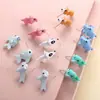 Pendientes de niña dinosaurio tiburón cachorro lindos transfronterizos pendientes de animales de dibujos animados mini joyería fresca al por mayor