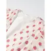 Atacado de roupas femininas transfronteiriças 2026 novo estilo de feriado vestido curto estampado com babados, decote V irregular e mangas compridas