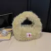 2026 Invierno Nuevo Bolso de Moda Elegante Texturizado Bolso de Mano para Mujer Casual y Moderno Diseño de Nicho Bolso de Mano