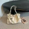 Bolsa tote minimalista de nicho Ruien para mulheres 2026 Outono nova chegada grande capacidade casual para o dia a dia ombro único axila