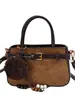 Bolso de mano con acabado mate retro, nueva colección otoño/invierno 2026, bolso cruzado versátil para mujer, bolso tote moderno y popular, bolso de mano pequeño