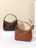 Bolsa Tejida Nueva Primavera/Verano 2026 Bolso de Mano Lujo Ligero Nicho Casual Bolsa para Lonchera Bolso de Hombro Bolso Dumpling Bolso de Axila