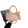 Bolso de Mano de Moda de Gama Alta Tipo Bollo para Mujer 2026 Nuevo Pequeño de Nicho Portátil para el Trabajo Elegante Bandolera Cruzada Pequeña