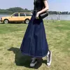 Saia Jeans de cintura alta semi-elástica feminina primavera e verão cobrindo a coxa figura em pera grossa Joker saia longa linha A plus size.
