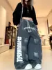 Pantalones Casuales Unisex Retro Americano Desgastado Estampado de Letras Silueta con Cordón Tendencia Holgados Pierna Ancha Scimitar Pantalones Largos