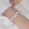 Fujian y Guangdong Plata de Ley 925 Plata Rota Perla de Imitación Pulsera de Campana para Mujer Ins Simple Nicho Moda de Gama Alta Exquisita Pulsera