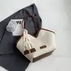 Bolso de Hombro Versátil Tejido Retro Transfronterizo para Mujer 2025 Nueva Moda Casual Bolso Tote de Color Contrastante para Viajes