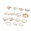 Conjunto de anéis geométricos, em forma de coração, vazados, cravejados de diamantes, best-seller europeu e americano transfronteiriço, uma coleção luxuosa e de alta qualidade de 15 peças para mulheres
