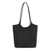 Bolsa de mano tejida estilo retro para mujer, nuevo diseño moderno y de moda 2026, con un toque de alta gama y gran capacidad, similar a una cesta de compras