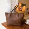 Bolsas de Mujer Transfronterizas 2026 Nueva Moda Retro Bolsas de Gran Capacidad para Mujeres Versátil Simple Casual Bolso de Hombro Tote