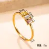 Anillo de acero inoxidable de moda transfronterizo, anillo de circón colorido elegante de lujo ligero, anillo de pareja chapado en oro de 18k, joyería para la mano