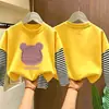 Camiseta Básica de Primavera e Outono para Meninas 2026 Novo Estilo Falsa Duas Peças Listrada Moda Outono Manga Longa para Crianças Mais Velhas