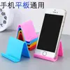 Soporte de escritorio perezoso para teléfono, soporte universal de color caramelo para teléfono y tableta, soporte de teléfono compacto y portátil