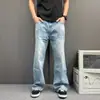 Jeans masculino estilo japonês cityboy azul claro lavado de perna reta, corte solto, casual, vintage, desgastado, versátil para o dia a dia, calça longa